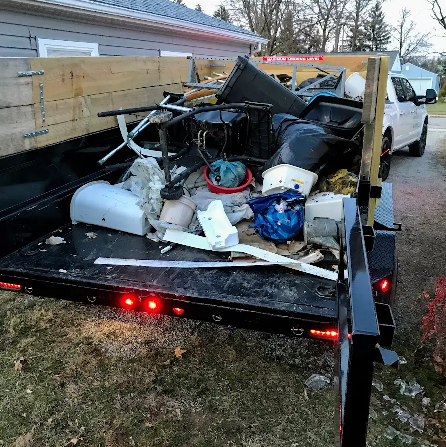 Roll-off dumpster delivered to a residential driveway in Highland Heights